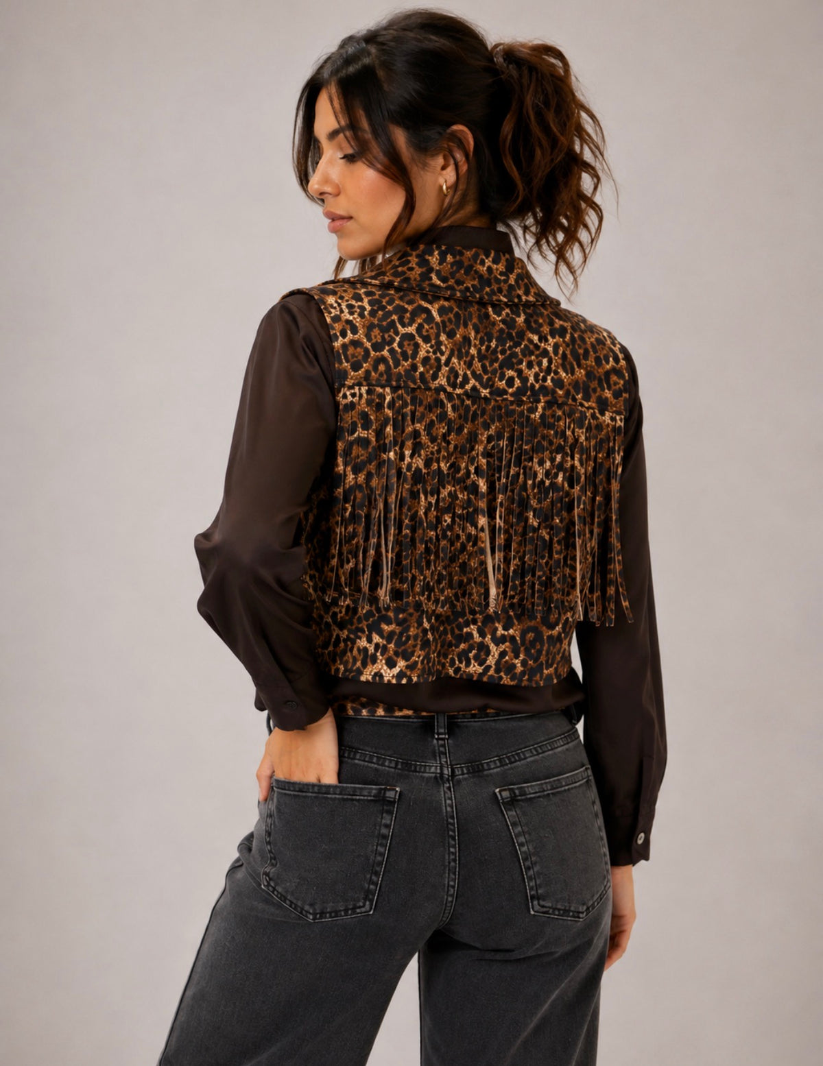 Gilet maculato con frange
